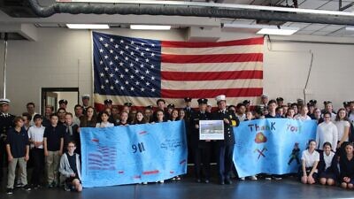 Students from Bi-Cultural Hebrew Academy (CT) present ‘thank you’ banners to the Stamford Fire Department