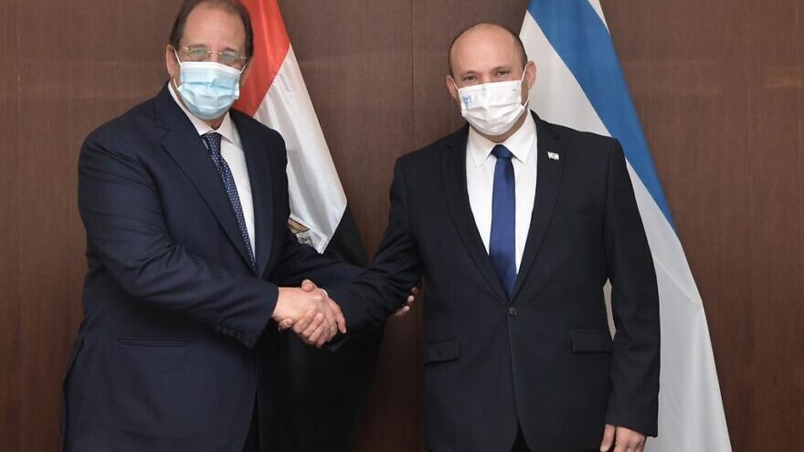 Israeli Prime Minister Naftali Bennett met with Egyptian Intelligence Minister Abbas Kamel in Israel on Aug. 18, 2021. Source: Twitter/PMO.
