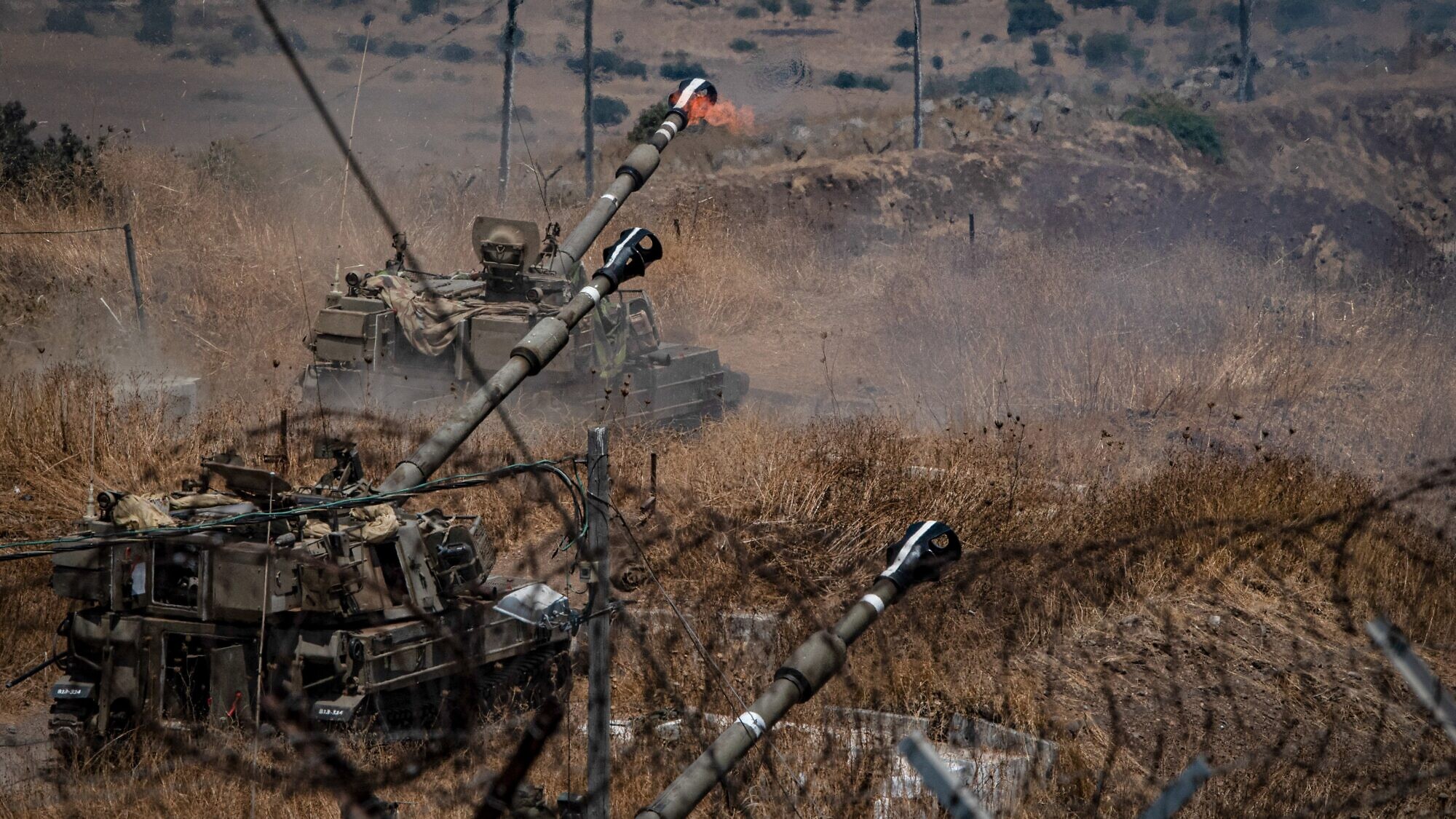 IDF artillery fires into Lebanon after Hezbollah fired 19 rockets into Israel, Aug. 6, 2021. Photo by Basel Awidat/Flash90.