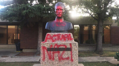 A statue dedicated to Ukrainian Roman Shukhevych was defaced with the words "actual Nazi" in August 2021. Credit: Friends of Simon Wiesenthal Center in Canada.