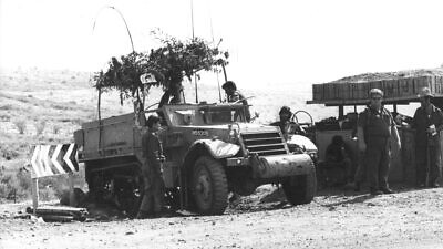 A sukkah on an Israeli army vehicle in the Golan during the 1973 Yom Kippur War. Photo by Nathan Fendrich, Courtesy of the Pritzker Family National Photography Collection at National Library of Israel.