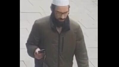Surveillance camera images of a man that police want to identify in connection to a series of assaults on Jewish men that took place in North London. Source: Screenshot.