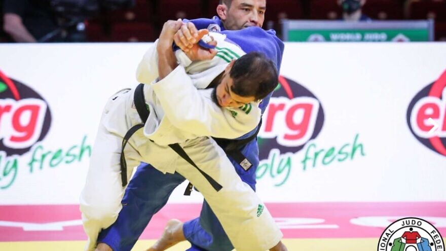Algerian judoka Fethi Nourine (blue) competing in 2021, prior to his ban. Credit: International Judo Federation.