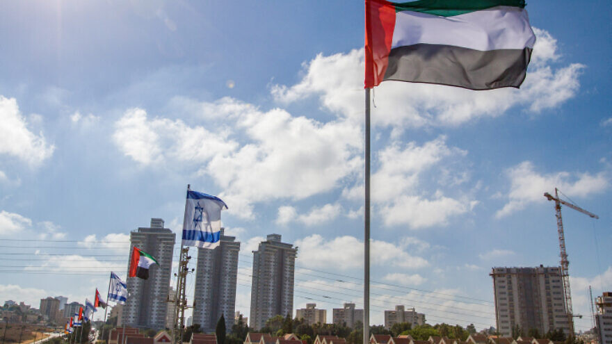 The Israeli and United Arab Emirates flags on the side of a road in the city of Netanya, Israel, on Aug. 16, 2020. Photo by Flash90.