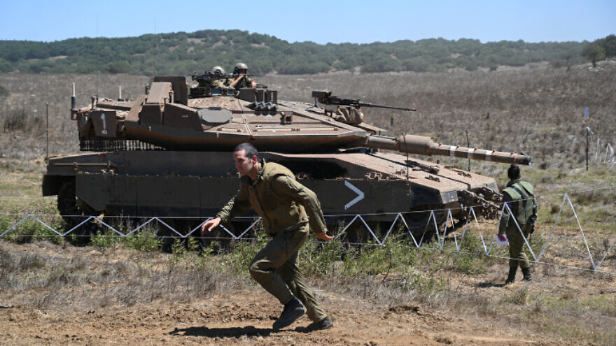 An Israeli tank near the Syrian border in the northern Golan Heights. Aug. 18, 2021. Photo by Michael Giladi/Flash90.