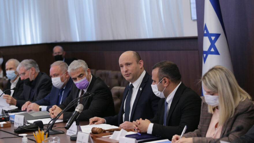 Israeli Prime Minister Naftali Bennett, Foreign Minister Yair Lapid and Finance Minister of Finance Avigdor Lieberman attend a Cabinet meeting at the Prime Minister's Office in Jerusalem, Oct. 17, 2021.