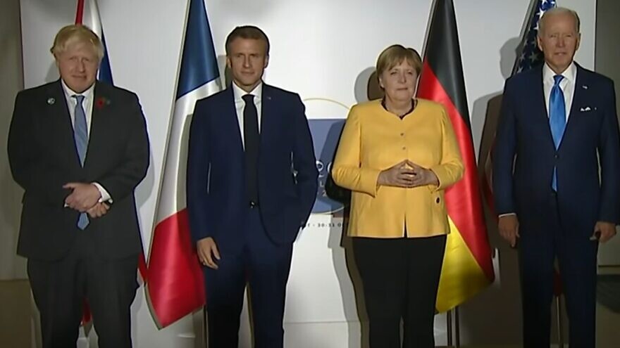 From left: British Prime Minister Boris Johnson, French President Emmanuel Macron, German Chancellor Angela Merkel and U.S. President Joe Biden at the G20 Summit in Rome, Oct. 30, 2021. Source: YouTube