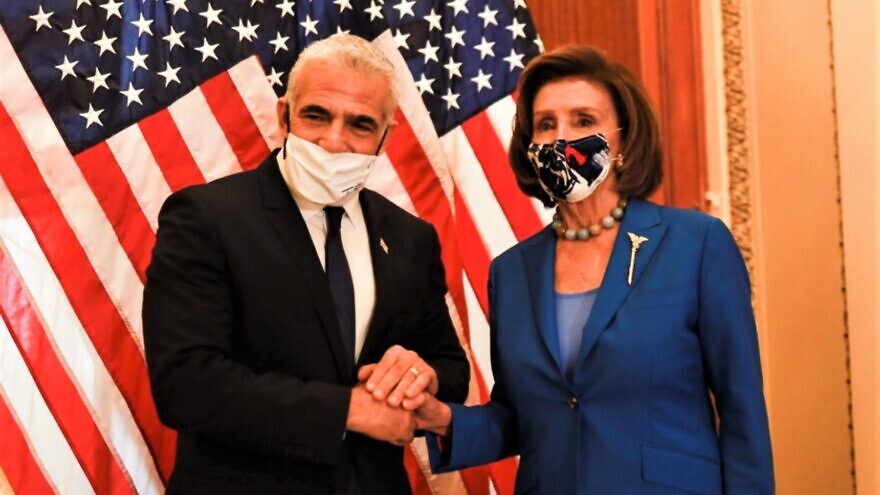 Then-Israeli Foreign Minister Yair Lapid and U.S. House Speaker Nancy Pelosi in Washington, D.C., on Oct. 12, 2021. Source: Twitter/U.S.House Speaker Nancy Pelosi.