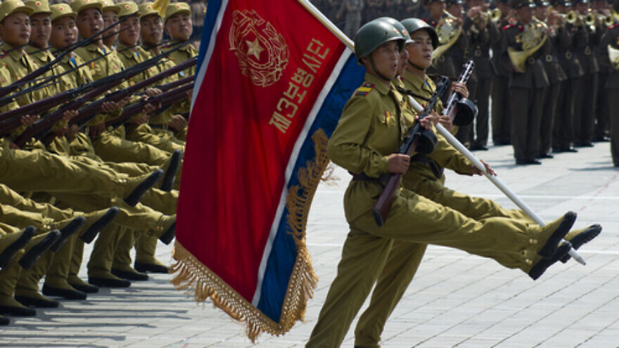 North Korean soldiers at the military parade in Pyongyang of the 60th anniversary of the conclusion of the Korean War. Pyongyang, North Korea. Circa July 2013. Credit: Astrelok/Shutterstock.