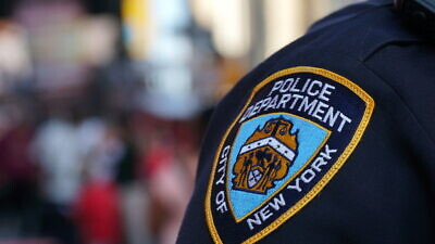 New York City Police Department officer patch. Credit: BrandonKleinPhoto/Shutterstock.