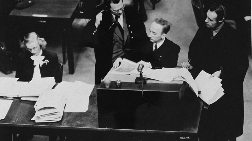 Chief prosecutor Benjamin Ferencz presents documents as evidence at the Einsatzgruppen Trial. Credit: United States Holocaust Memorial Museum/Courtesy of Benjamin Ferencz.