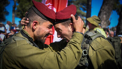 Israeli soldiers during a swearing-in ceremony for the Paratroopers Brigade, at Ammunition Hill in Jerusalem on Nov. 11, 2021. Photo by Arie Leib Abrams/Flash90.