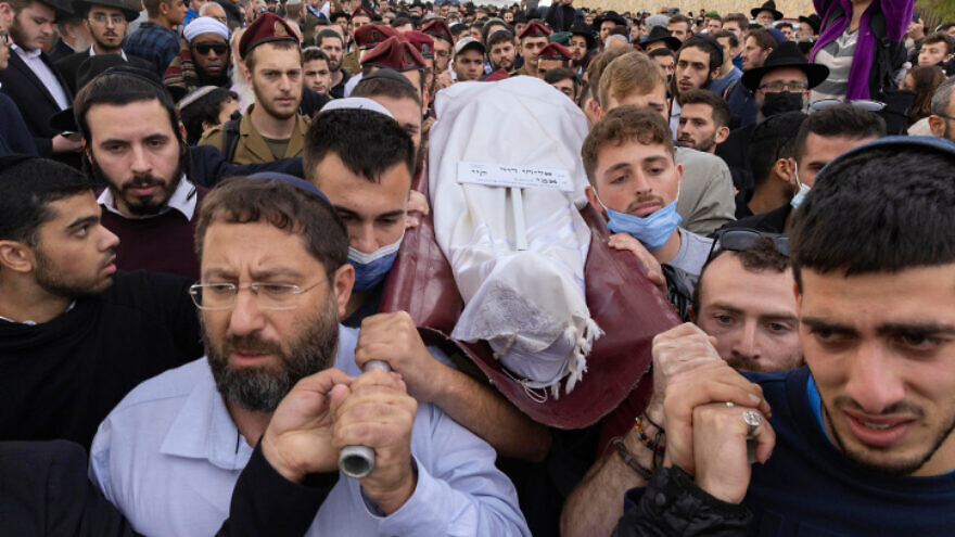 Friends and family attend the funeral of Eliyahu Kay, a 25-year-old immigrant from South Africa who was killed in a terror attack in Jerusalem's Old City, at Har HaMenuchot Cemetery in Jerusalem on Nov. 22, 2021. Photo by Olivier Fitoussi/Flash90.