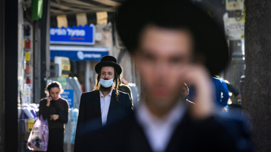 Religious Jews on a Jerusalem street, Nov. 24, 2021. Photo by Olivier Fitoussi/Flash90.