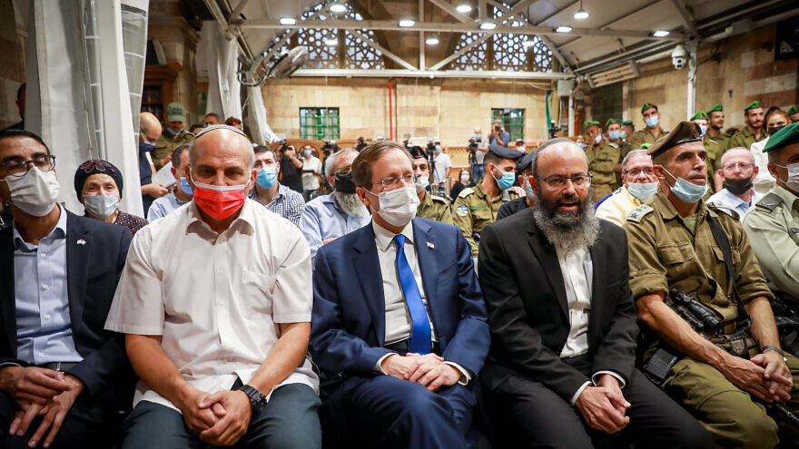 Israeli President Isaac Herzog attends a ceremony on the first night of Hanukkah at the Cave of the Patriarchs in the West Bank city of Hebron, Nov. 28, 2021. Photo by Gershon Elinson/Flash90.