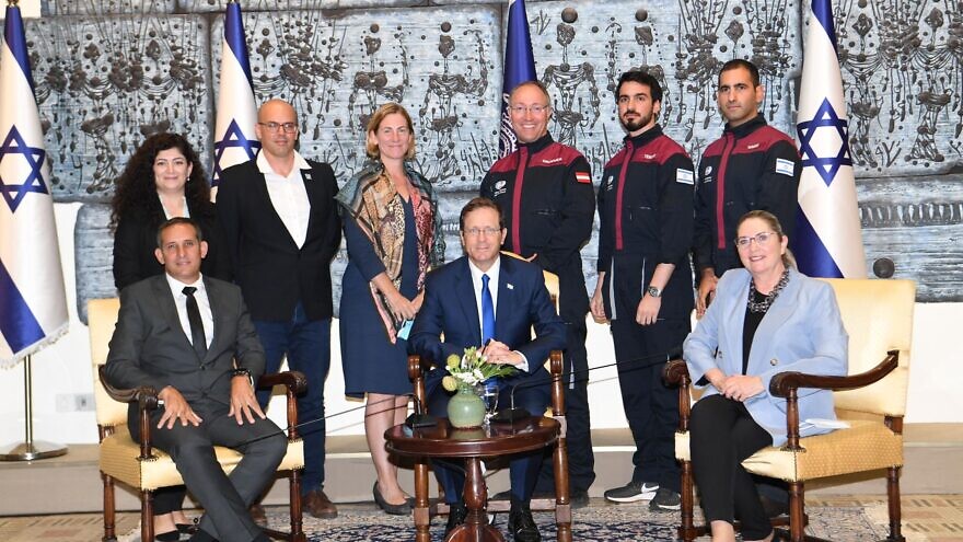 Israeli President Isaac Herzog, with analog astronauts of the AMADEE 20 Mars Simulation, at the President's Residence in Jerusalem on Nov. 2, 2021.  Credit: Amos Ben-Gershom/GPO.