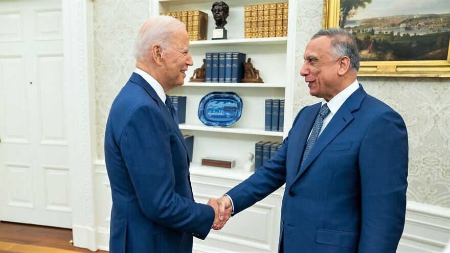 U.S. President Joe Biden greets Iraqi Prime Minister Mustafa Al-Khadimi in the Oval Office of the White House, July 26, 2021. Credit: Official White House Photo by Adam Schultz.
