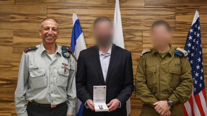 A ceremony to award a service medal to the United States Cyber Command Liaison Officer in Israel, “Mr. M.” Credit: Courtesy of IDF Spokesperson
