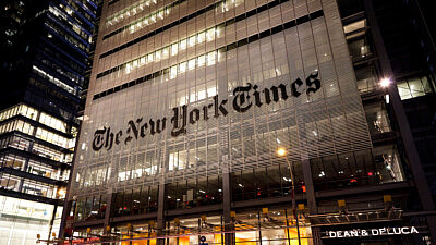 “The New York Times” headquarters at night. Credit: Osugi/Shutterstock.