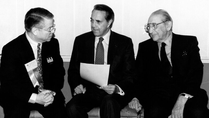 Sen. Bob Dole (center) discusses the relocation of the U.S. embassy from Tel Aviv to Jerusalem, with AIPAC's Robert Asher (left), former chairman and president of AIPAC, in 1995. On the right is the chairman of Dole's run for president, Max M. Fisher. Credit: Dole Institute of Politics.