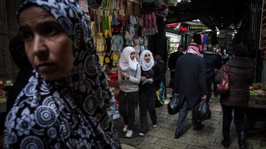 Women shopping in the Muslim Quarter market in Jerusalem's Old City on Feb. 9, 2015. Photo by Hadas Parush/Flash90.