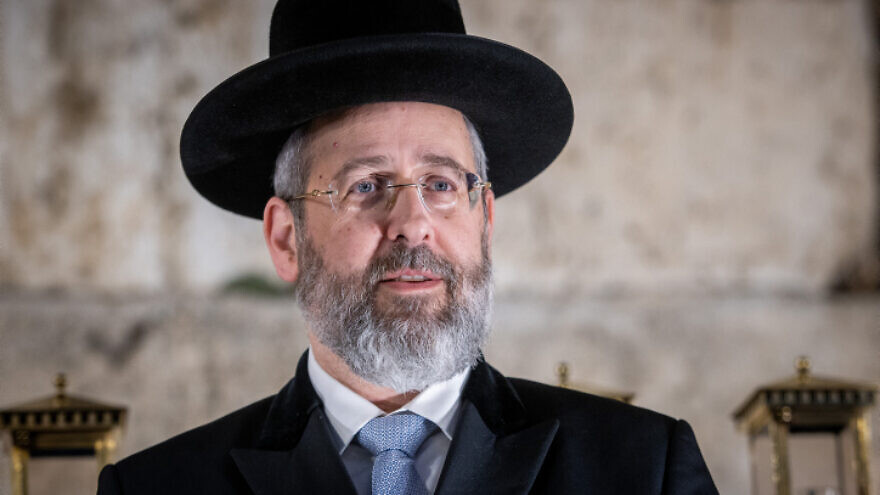 Israel's Ashkenazi Chief Rabbi David Lau attends a ceremony on the first night of Hanukkah, at the Western Wall in Jerusalem, Nov. 28, 2021. Photo by Flash90.