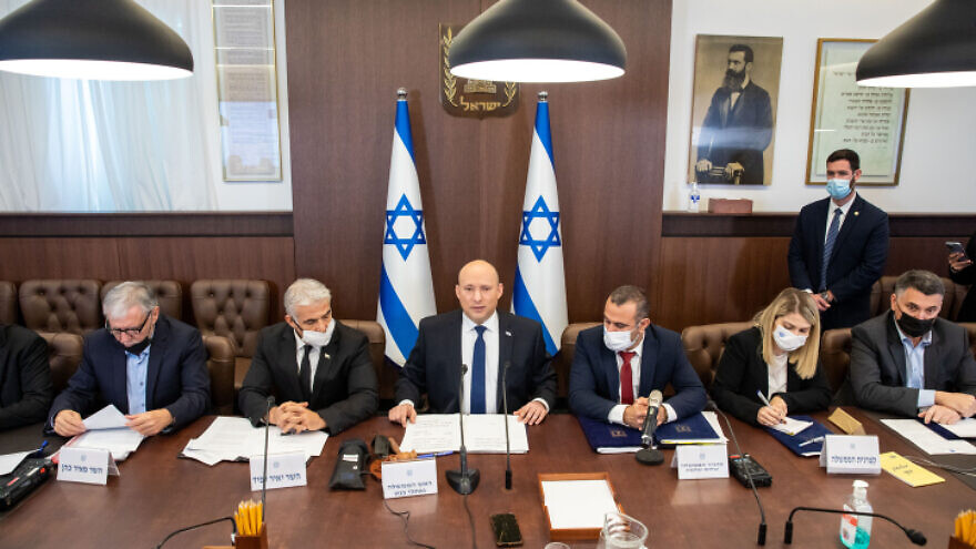 Israeli Prime Minister Naftali Bennett leads the weekly Cabinet meeting at the Prime Minister's Office in Jerusalem, Dec. 5, 2021. Photo by Emil Salman/POOL.