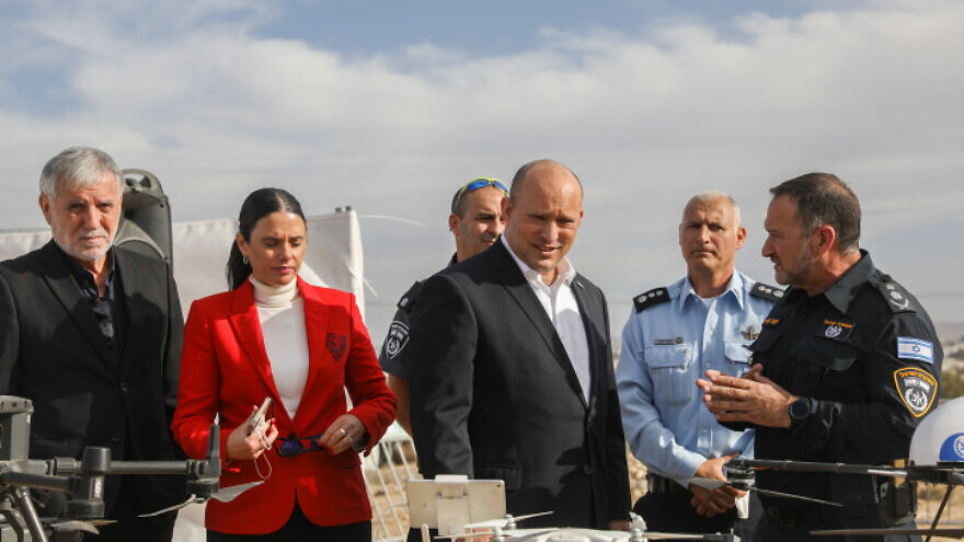 Israeli Prime Minister Naftali Bennett, Israeli Police chief Kobi Shabtai, Interior Minister Ayelet Shaked and Minister of Labor, Social Affairs and Social Services Meir Cohen during a visit to Rahat in southern Israel on Dec. 6, 2021. Photo by Noam Revkin Fenton/Flash90.