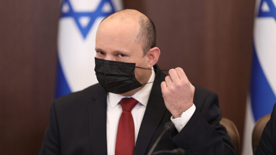 Israeli Prime Minister Naftali Bennett leads a Cabinet meeting at the Prime Minister's Office in Jerusalem on Dec. 19, 2021. Photo by Emil Salman/POOL.