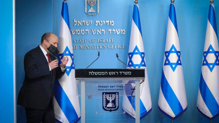 Israeli prime minister Naftali Bennett holds a press conference at the Prime Minister's office in Jerusalem on December 19, 2021. Photo by Marc Israel Sellem.