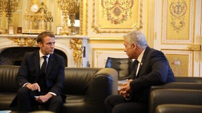 Then-Israeli Foreign Minister Yair Lapid meets with French President Emmanuel Macron in Paris, Nov. 30, 2021. Source: Twitter.