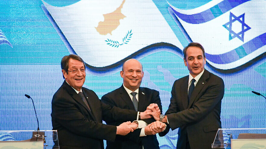 Israeli Prime Minister Naftali Bennett holds a press conference in Jerusalem with Cyprus President Nicos Anastasiades (left) and Prime Minister of Greece Kyriakos Mitsotakis as part of their eighth trilateral meeting, Dec. 7, 2021. Photo by Rafi Kutz/POOL.