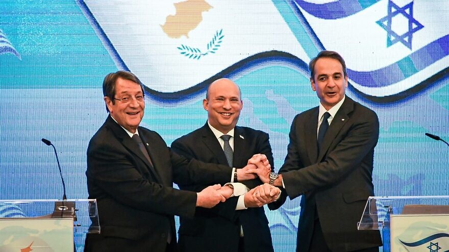 Israeli Prime Minister Naftali Bennett holds a press conference in Jerusalem with Cyprus President Nicos Anastasiades (left) and Prime Minister of Greece Kyriakos Mitsotakis as part of their eighth trilateral meeting, Dec. 7, 2021. Photo by Rafi Kutz/POOL.