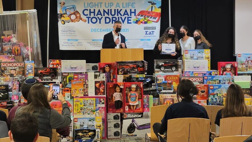 Binghamton University students gather for an annual toy drive for sick children during the holiday of Hanukkah, 2021. Credit: Rohr Chabad Center for Jewish Student Life at Binghamton University.