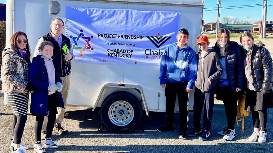 Ms. E, Orly, Mr. Lassner, Aaron, Jeremy, Shirel and Chloe arrive Project Friendship Warehouse for first day of chesed. Credit: Courtesy.