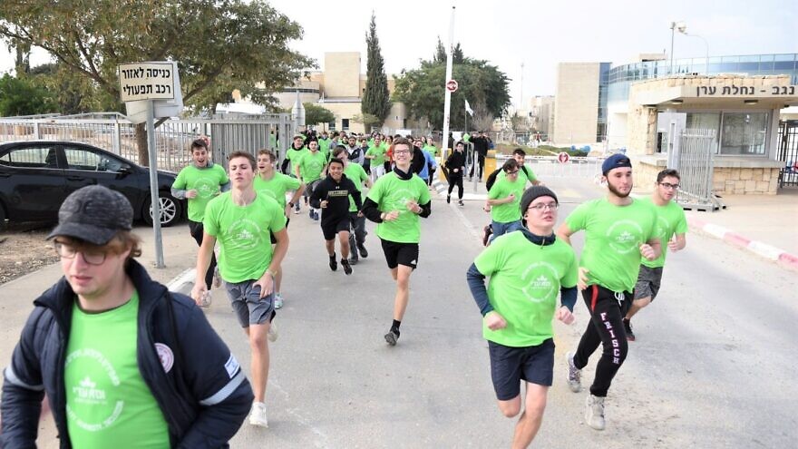 North American gap year students pound the pavement at ADI Negev-Nahalat Eran to raise disability awareness at ADI’s First Annual ‘Race for Inclusion’ on Wednesday, December 29.