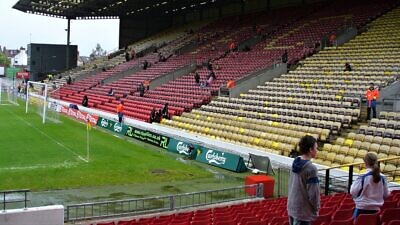 The Rookery stand at Vicarage Road stadium, home of Watford FC. Credit: DWC LR via Wikimedia Commons.