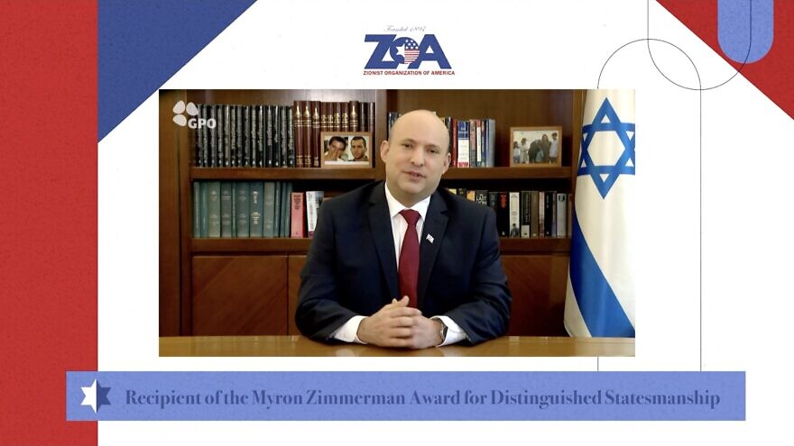 Israeli Prime Minister Naftali Bennett addresses the Zionist Organization of America during its virtual gala, where he was presented with the Myron Zimmerman Award for Distinguished Statesmanship, December 2021. Source: Screenshot.