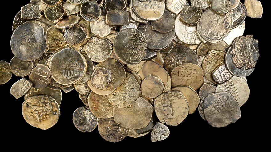 A hoard of coins from the Mamluk period discovered off the coast of Caesarea in 2021. Credit; Israel Antiquities Authority.