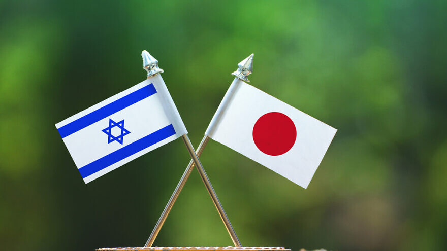 Israeli and Japanese flags. Credit: Aritra Deb/Shutterstock.