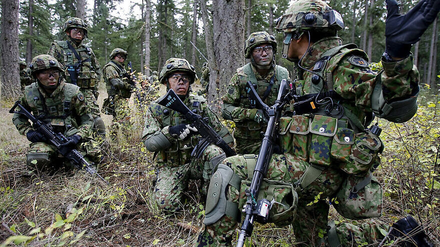 Japanese soldiers from the 22nd Infantry Regiment of the Japan Ground Self-Defense Force train in urban assault with U.S. soldiers in October 2008, during a bilateral exercise at Fort Lewis's Leschi Town. Credit: U.S. Army via Wikimedia Commons.