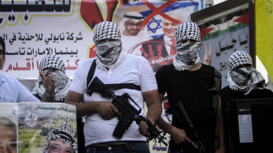 Members of Fatah's Al-Aqsa Martyrs’ Brigades take part in a protest against  the Abraham Accords between Israel and the United Arab Emirates, Aug. 22, 2020. Photo by Nasser Ishtayeh/Flash90.
