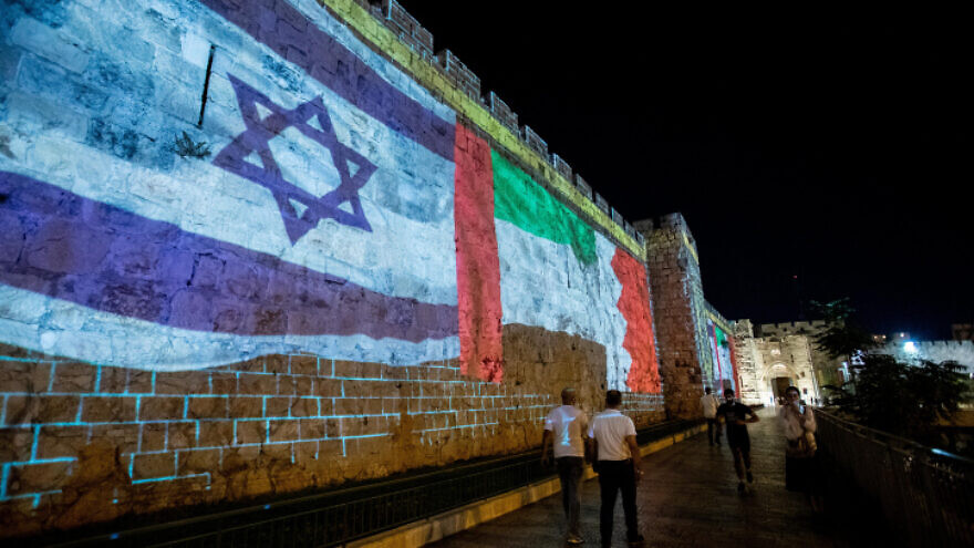 The flags of the U.S., United Arab Emirates, Israel and Bahrain are screened on the walls of Jerusalem's Old City, on September 15, 2020. Photo by Yonatan Sindel/Flash90