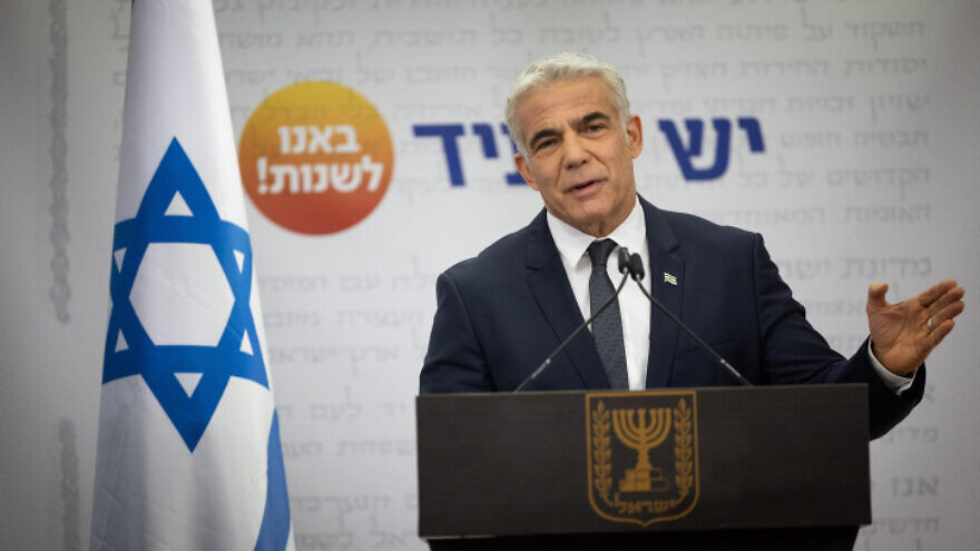 Israeli Foreign Minister and head of the Yesh Atid Party Yair Lapid speaks during a faction meeting at the Knesset in Jerusalem on Dec. 13, 2021. Photo by Yonatan Sindel/Flash90.
