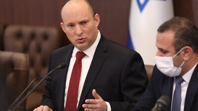 Israeli Prime Minister Naftali Bennett leads a cabinet meeting at the Prime Minister's Office in Jerusalem on Dec. 19, 2021. Photo by Emil Salman/POOL.