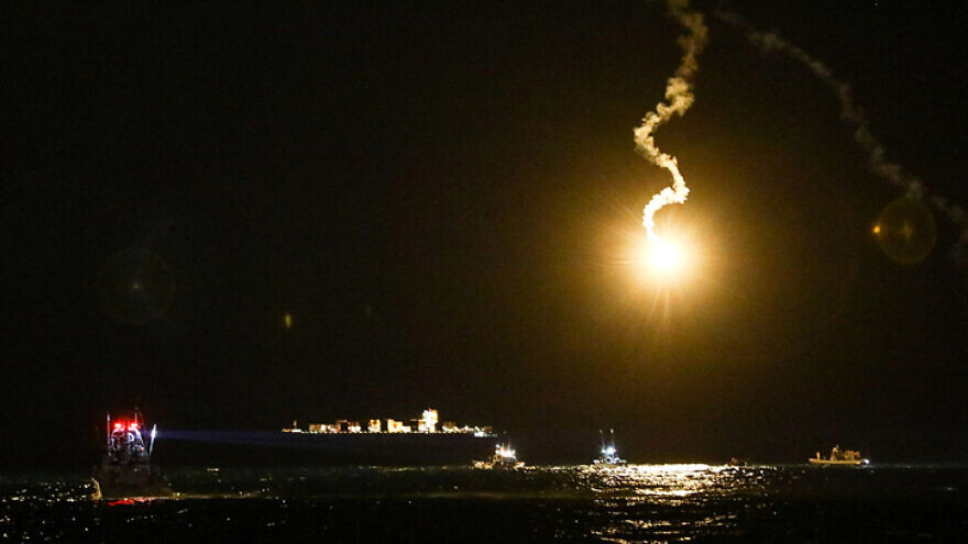 An Israeli army flare illuminated the sky during searches for survivors after a helicopter crashed off the coast of the northern Israeli city of Haifa on Jan. 4, 2022. Photo by Shir Torem/Flash90.