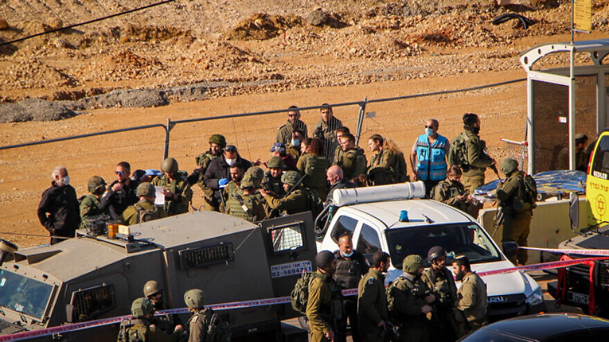 Israeli security forces near the scene of an attempted stabbing at the Gush Eztion Junction in Judea and Samaria, on Jan. 17, 2021. Photo by Gershon Elinson/Flash90.
