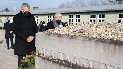 Chancellor of Austria, Karl Nehammer, and Israeli Foreign Minister Yair Lapid visited the Mauthausen Concentration Camp in Austria to mark International Holocaust Remembrance Day. (credit: Twitter)