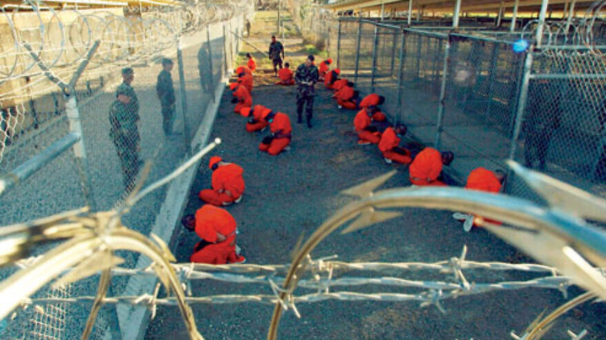 Guantanamo captives in January 2002. Credit: Petty Officer 1st class Shane T. McCoy, U.S. Navy via Wikimedia Commons.