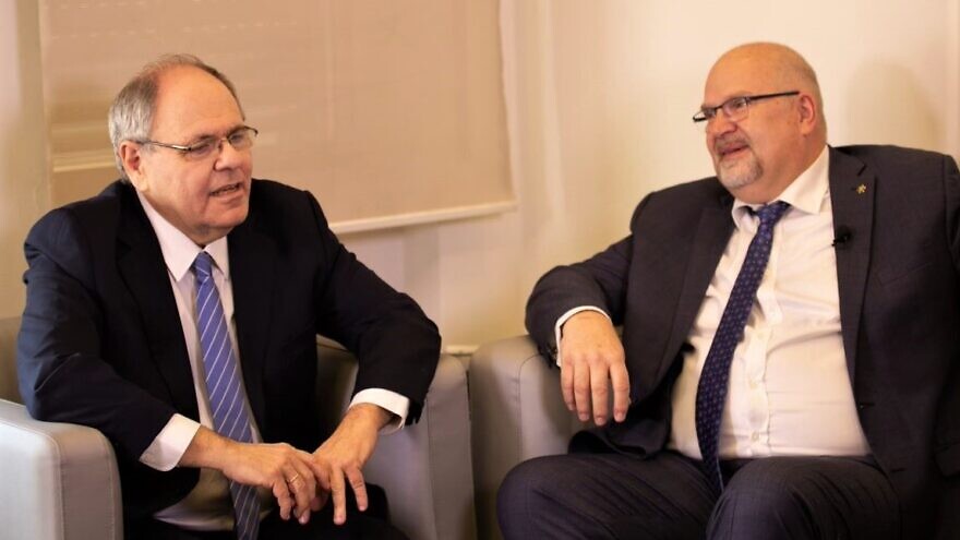 Yad Vashem chairman Dani Dayan, (left) speaks with Jürgen Bühler, president of the International Christian Embassy Jerusalem, during an online conference for pastors and clergy from around the world, January 2022. Credit: ICEJ.